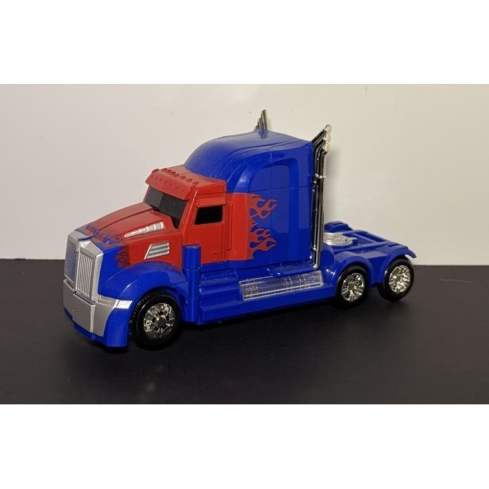 Transformers Robot Truck Car Toy Lights Sounds Bump and Go Action Gift Toy Kids